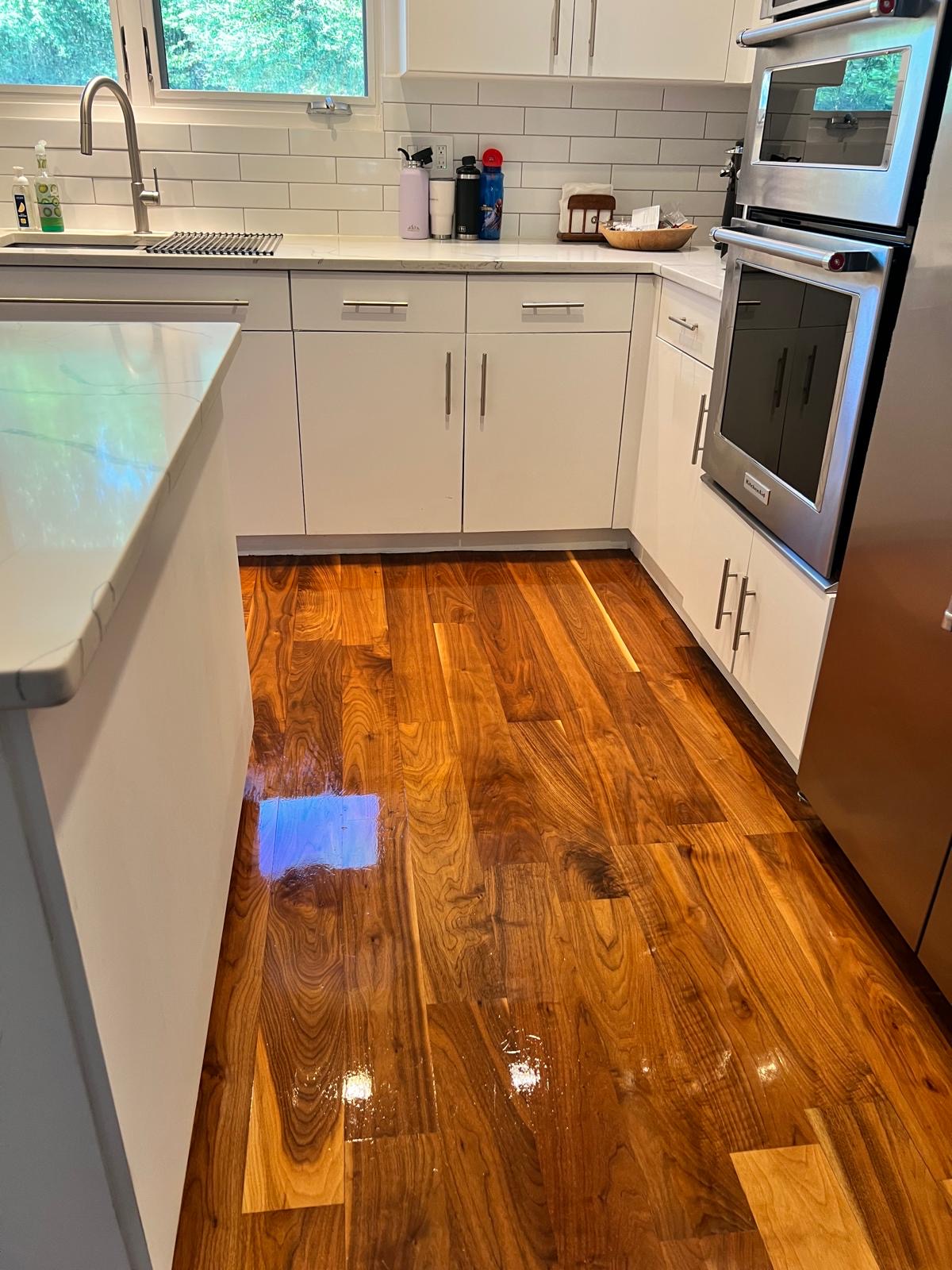Kitchen and hardwood floors cleaned by OxyPro Cleaning Services